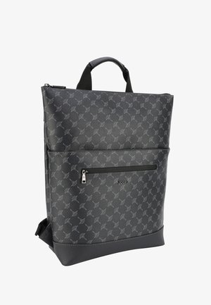 Black backpack with gray repeating pattern, front zip pocket, top handle, and brand name "JOOP!" on front.