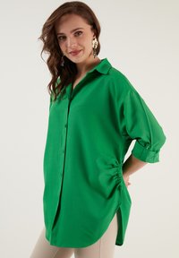 LELA Blusa - benetton color
