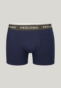Granatowe bawełniane bokserki z miękkim, elastycznym pasem w talii, z napisem "PRÓCHNIK" wydrukowanym na białym tle. Dopasowany krój, długość do połowy uda.
