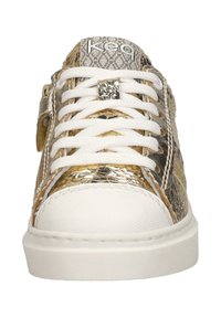 Gold and white sneakers with a metallic sheen, featuring white laces, textured upper, and a Velcro strap on the side. Accents include a diamond-like detail.
