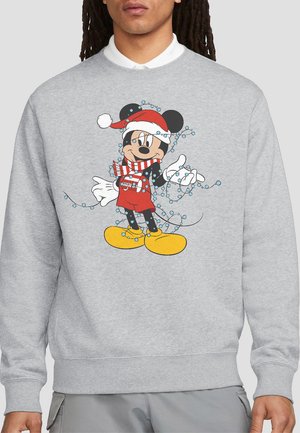 Gray sweatshirt featuring a cartoon character in a red Santa hat, red overalls, and striped scarf, surrounded by blue decorative lights.