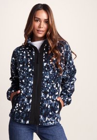 Fleece jacket with a blue and white speckled pattern, featuring a zip front, high collar, and side pockets. Soft texture and relaxed fit.