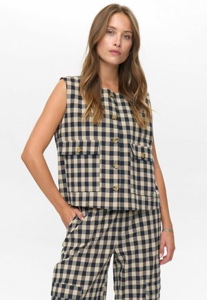 Navy and beige checkered sleeveless vest with two front pockets and button closure, made from textured fabric.