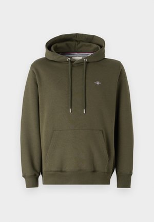 Haut à capuche vert olive en tissu mélangé coton, avec une poche frontale, des cordons de serrage ajustables et un petit logo sur la poitrine.