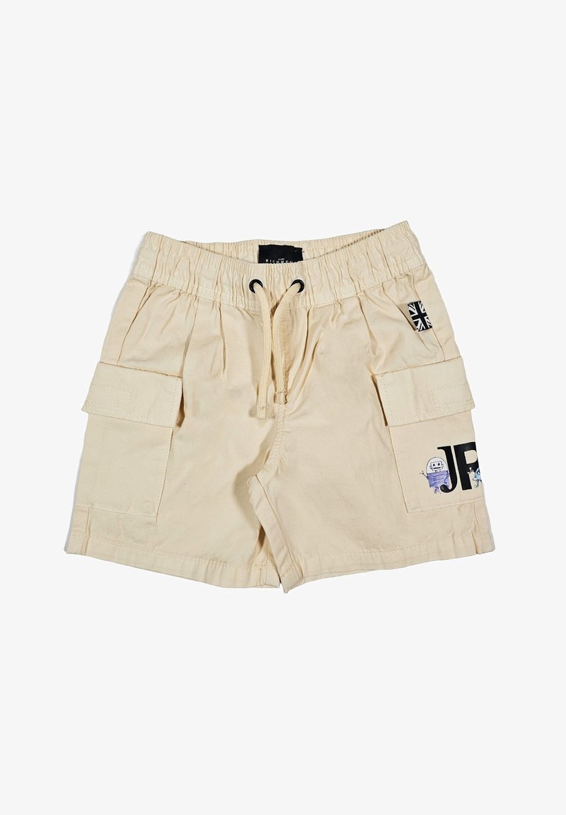 Pantaloni cargo beige con elastico in vita e cordoncino. Presentano due tasche laterali e un design stampato sulla gamba destra inferiore.