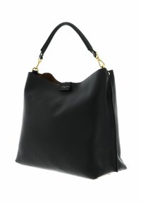 Sac à main en cuir noir texturé avec une poignée unique et des ferrures en or, ouvert sur le dessus révélant un intérieur marron clair.