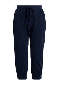 Pantalon de jogging bleu marine avec taille élastique et cordon de serrage réglable. Comprend des bords-côtes effilés et des poches latérales pratiques. Tissu léger.