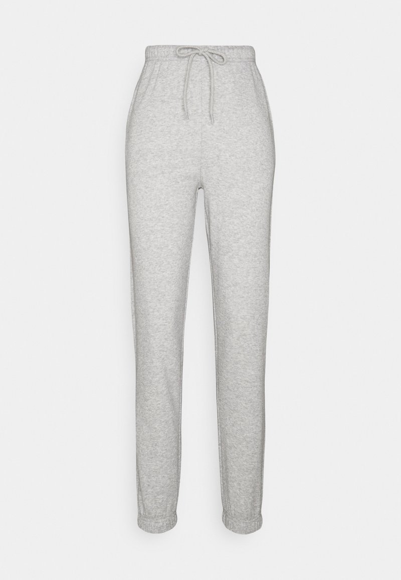 Ljusa gråa joggerbyxor i mjuk bomullsblandning, med elastisk midja och dragsko samt muddade benslut. Mjuk textur, avslappnad design.