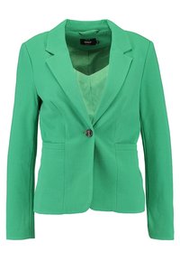 Blazer vert avec une fermeture à un bouton, des revers crantés, deux poches à l'avant et une doublure intérieure lisse. Confectionné dans un tissu léger.
