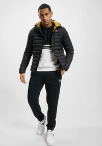 Sergio Tacchini NESSEN  - Zimní bunda - black harvest gold