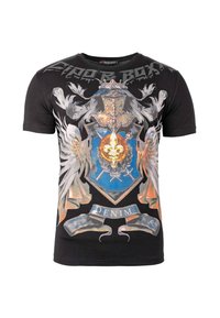 Zwart katoenen T-shirt met een gedetailleerd embleemontwerp met vleugels, een schild en een lint met de tekst "DENIM" in het midden.