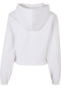 Felpa bianca tagliata con cappuccio regolabile, maniche lunghe, polsini a coste e una superficie in cotone liscia. Nessun motivo o logo visibile.