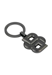 Black metal keychain featuring a stylized logo with two interlocking shapes. Smooth finish and circular attachment ring for keys.