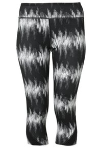 Czarno-białe legginsy sportowe z ząbkowanym wzorem, z wysokim stanem i dopasowanym krojem do kostek. Gładki, elastyczny materiał.