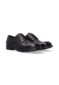 Zwarte leren Oxford schoenen met een ronde neus, gezTextureerde brogue-details, dunne veters en een lage gestapelde hak. Gladde afwerking en subtiele glans.