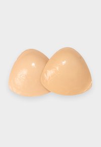 Two flesh-toned silicone breast forms with a smooth, glossy surface, seamlessly shaped in a curved, triangular design.