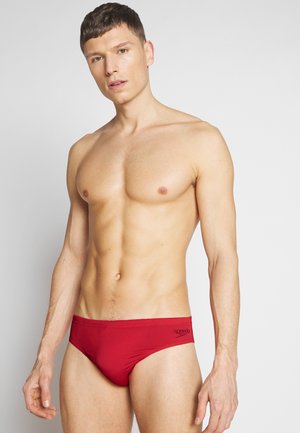 ESSENTIALS - Swimming briefs - fed red