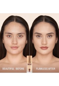Before-and-after display featuring a foundation bottle centered between a model's skin showing blemishes on the left and smooth skin on the right.
