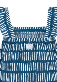 Mėlynai ir baltai dryžuotas viršus su plonais dirželiais ir susiraukšlėta struktūra, šone su logotipo etikete. Minkšta medžiaga, kasdieniškas dizainas.