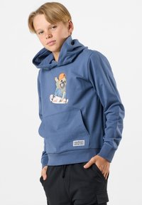 Felpa blu realizzata in cotone misto, con tasca frontale e una grafica di un cane dei cartoni animati su uno skateboard. Polsini e orlo a costine.