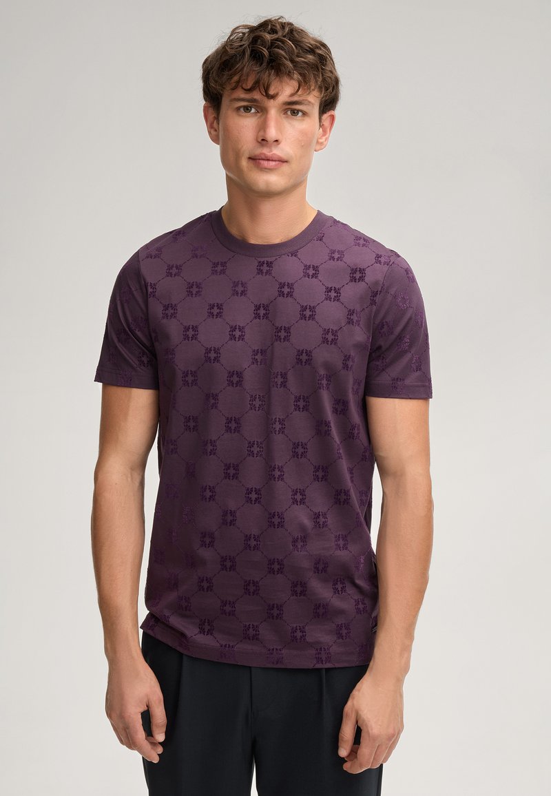 Lila Kurzarm-T-Shirt mit einem strukturierten Muster aus kreisförmigen Designs, aus weichem Stoff gefertigt, mit einem klassischen Rundhalsausschnitt.