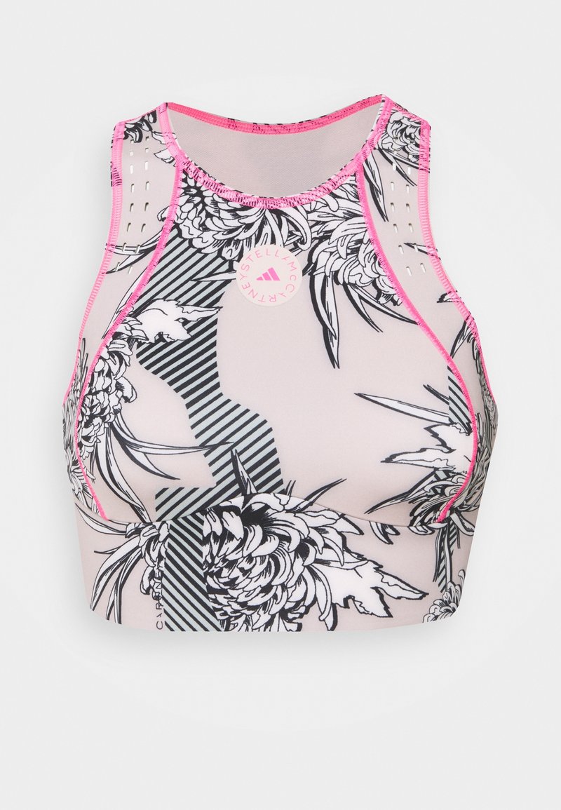 Crop top sportivo con motivi floreali neri e strisce su uno sfondo rosa chiaro, con bordi rosa e dettaglio del logo.