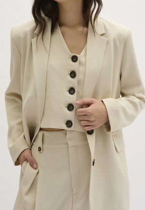 Manteau court - beige