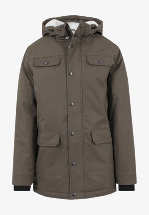 Brown waterproof parka with a fleece-lined hood, snap buttons, chest and side pockets, and ribbed cuffs for warmth.