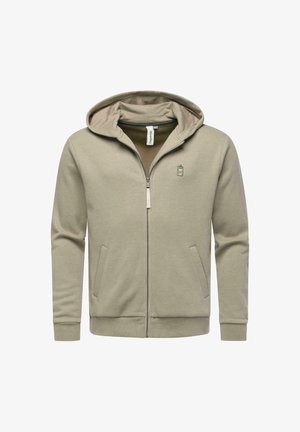 Jasno beżowy rozpinany hoodie z kapturem, przednimi kieszeniami i małym, zielonym haftowanym logo. Miękka tkanina o gładkiej fakturze.