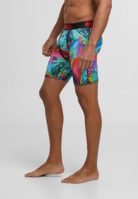 Boxerii pentru bărbați în culori vesele, cu un print grafic mixt, bandă elastică cu logo și un design ajustat pentru confort și suport.