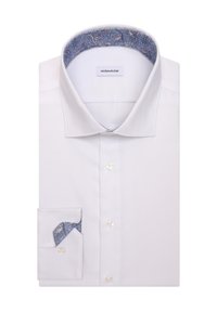 Chemise blanche à manches longues avec motif cachemire à l'intérieur du col et des poignets, pliée avec les boutons visibles à l'avant.