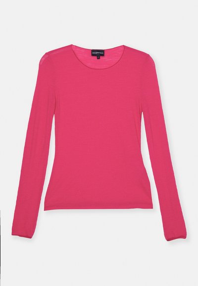Hosszú ujjú felső élénk rózsaszínben, lekerekített nyakkivágással, bordázott textúrával és minimális varrásokkal, könnyű anyagból készítve.