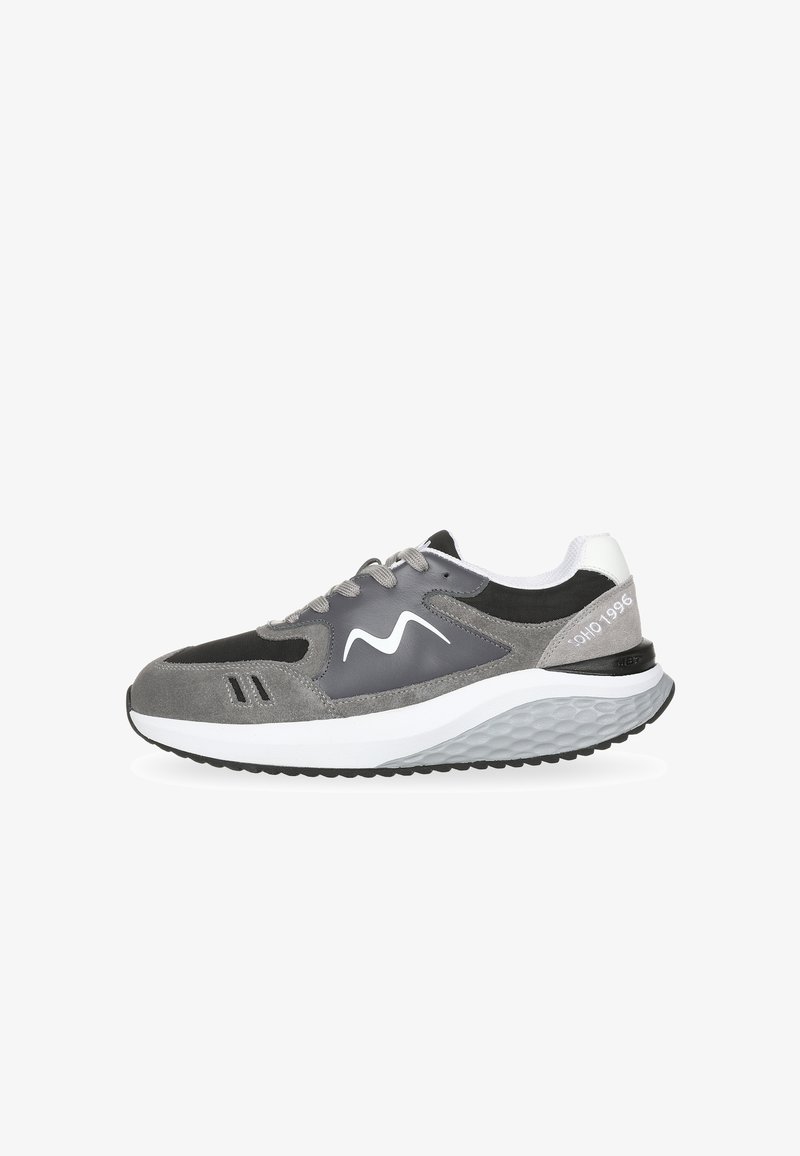 Gray athletic shoe with suede and mesh materials, white accents, rounded toe, textured midsole, and logo detail on the side and heel.