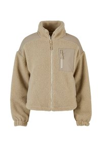 Bež flis jakna s kompletnim prednjim patentnim zatvaračem, visokim ovratnikom, džepom na prsima sa patentnim zatvaračem i elastičnim manžetama na dugim rukavima.