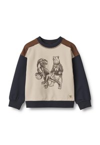 Felpa beige con maniche blu navy e dettagli marroni sulle spalle. Presenta una grafica di un dinosauro e un orso, con l'orso che indossa un maglione.