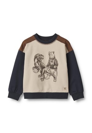Felpa beige con maniche blu navy e dettagli marroni sulle spalle. Presenta una grafica di un dinosauro e un orso, con l'orso che indossa un maglione.