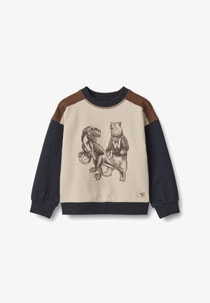 Felpa beige con maniche blu navy e dettagli marroni sulle spalle. Presenta una grafica di un dinosauro e un orso, con l'orso che indossa un maglione.