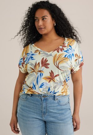 Floral short-sleeved top in light yellow with blue, orange, and brown leaf patterns; V-neck design and soft, lightweight fabric.