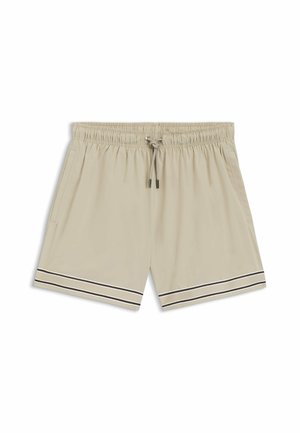 Pantalones cortos beige con cintura elástica y cordón, dos bolsillos laterales y doble franja negra cerca del dobladillo en ambas piernas.