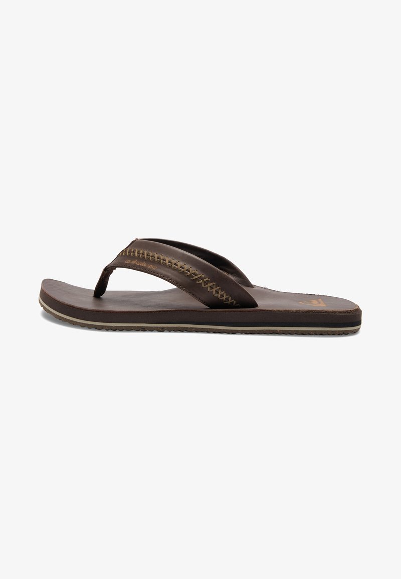 Brown leather flip-flop with two V-shaped straps, decorative stitching, flat sole, and textured bottom for grip.