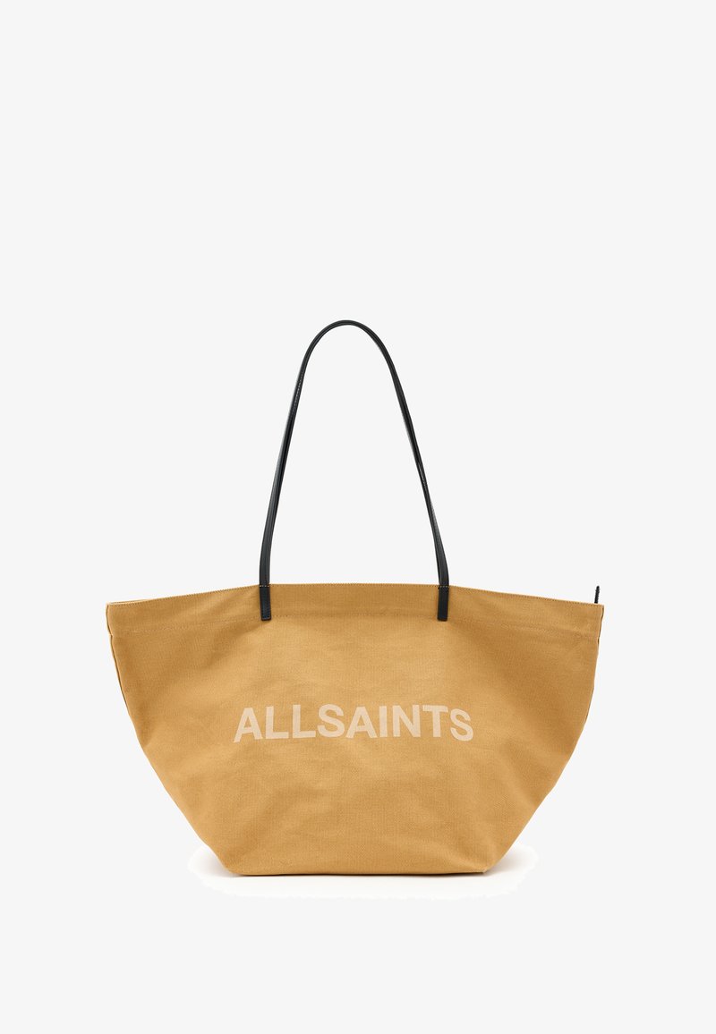 Große braune Leinentragetasche mit schwarzen Ledergriffen und weißem "ALLSAINTS"-Text auf einer Seite. Besitzt eine breite Öffnung und eine strukturierte Form.