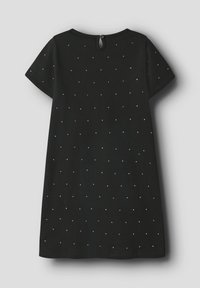 Schwarzes Kleid mit kurzen Ärmeln, versehen mit einem gepunkteten Muster aus silbernen Verzierungen. Knopfverschluss auf der Rückseite, weiche Stofftextur.