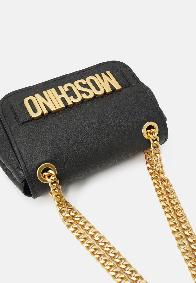 MOSCHINO LETTERING SHOULDER BAG - Umhängetasche - black/schwarz  