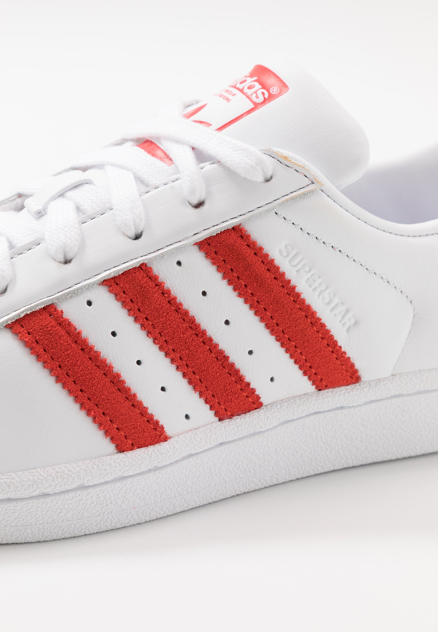 red superstar trainers