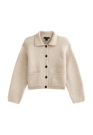Cardigan beige en tricot avec des boutons, à manches longues, deux poches avant et un col, fabriqué à partir d'un tissu en laine côtelé.