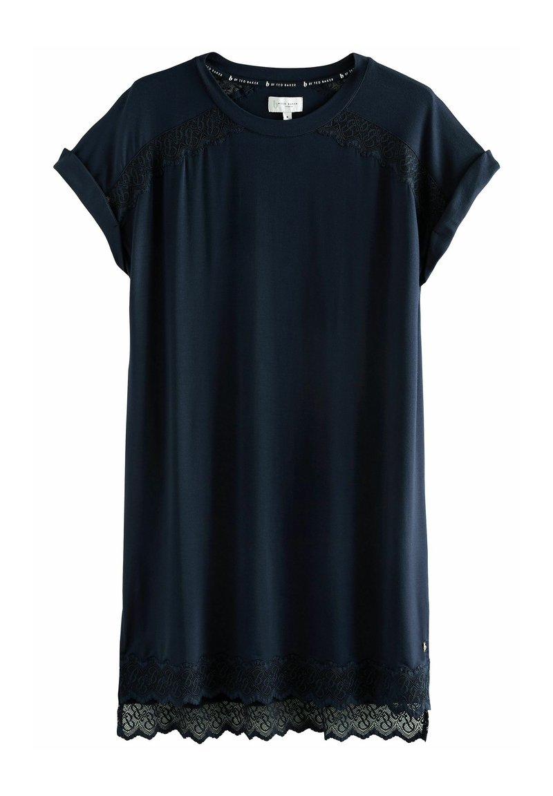 Marineblaue T-Shirt mit kurzen hochgerollten Ärmeln, Spitze an den Schultern und einem gewellten Spitzenabschluss. Hergestellt aus einem glatten Stoff.