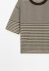 Short-sleeve crewneck shirt with horizontal brown and white stripes on a plain background.
