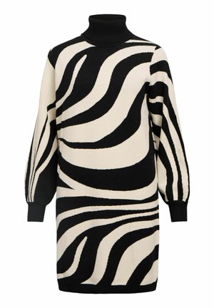 Dzianinowa sukienka z wysokim golfem, z czarno-kremowym wzorem w swirl w motyw zebry. Długie, balonowe rękawy z prążkowanymi mankietami.