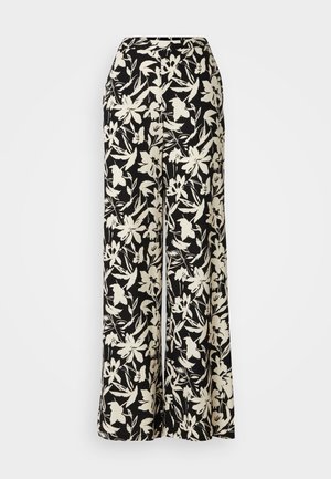 Pantalons larges noirs avec un motif floral blanc, dotés d'une taille haute et d'une texture de tissu lisse. Convient à diverses occasions.