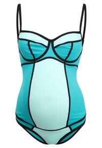 Schwangerschaftsbadekleid in Türkis und Hellblau mit schwarzem Piping. Es verfügt über ein strukturiertes Design mit verstellbaren Trägern und einem unterstützenden Oberteil.